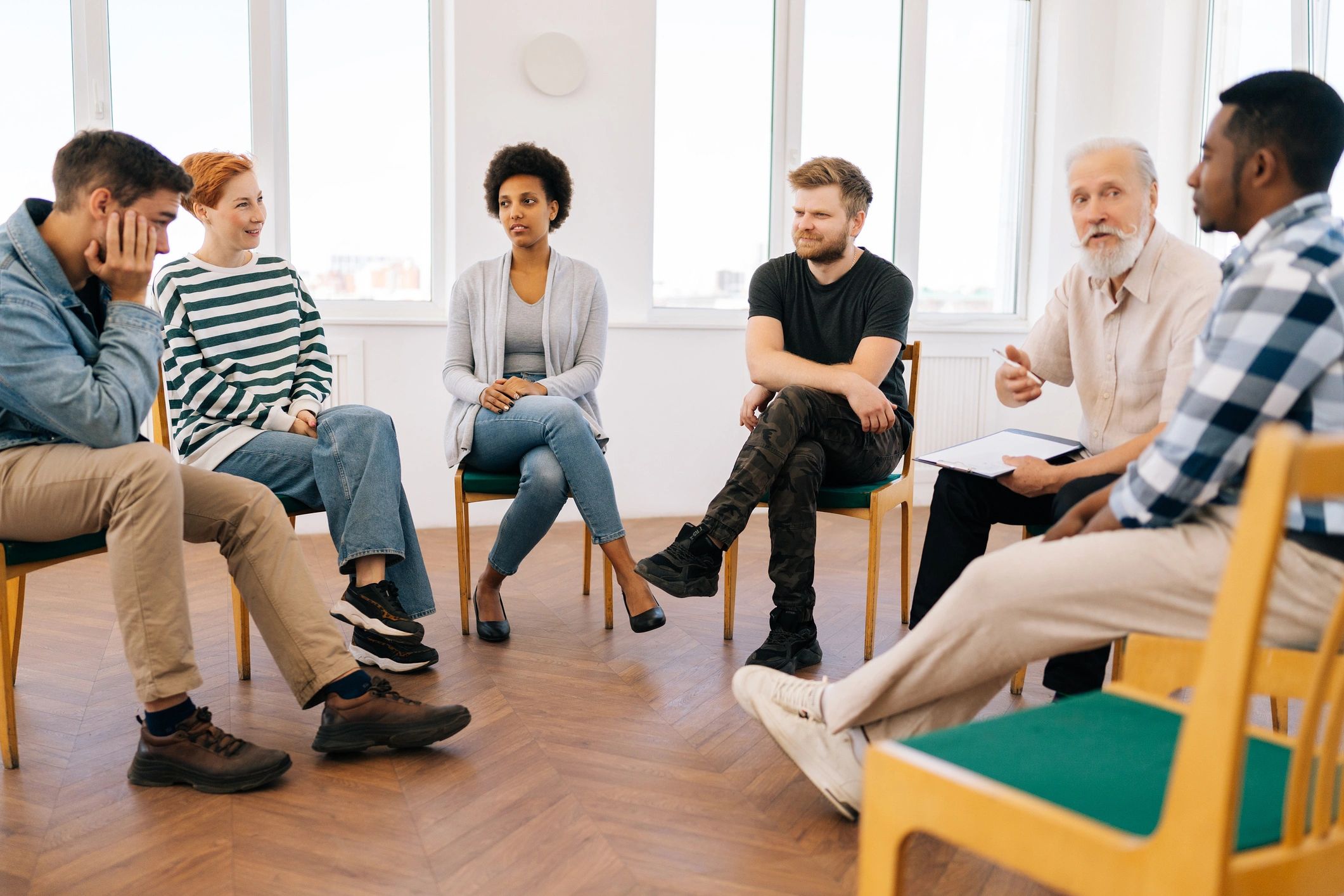 Group discussion in a circle during a reflective session