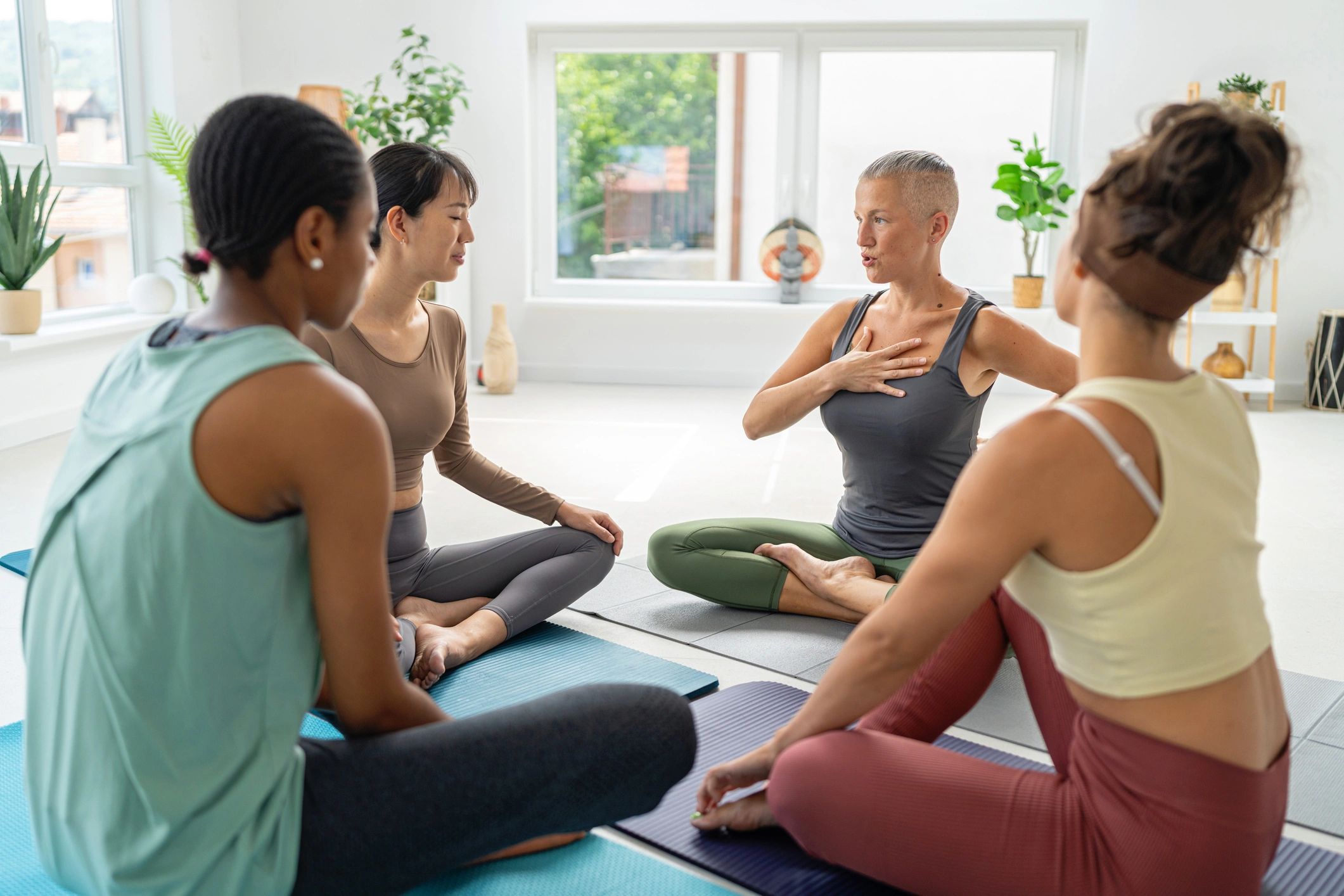 Group discussion in a serene yoga studio